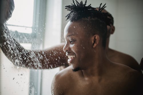 Free Close-up of Happy Men Having Shower Stock Photo