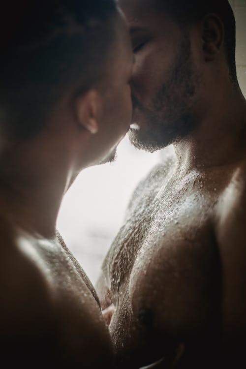 Free Close Up of Two Men Kissing Stock Photo
