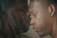 Close-up of Men Having Shower Together