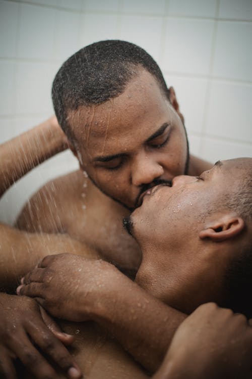 Free Close Up of Two Men Kissing Stock Photo
