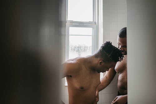 Free Two Naked Men in a Bathroom Stock Photo