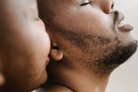 Man Kissing Womans Cheek