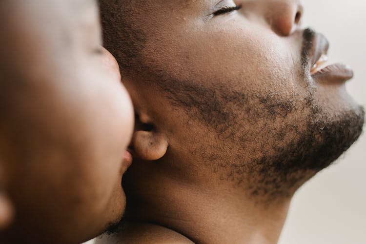 Man Kissing His Lovers Ear