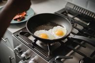 2 Fried Eggs on Black Frying Pan