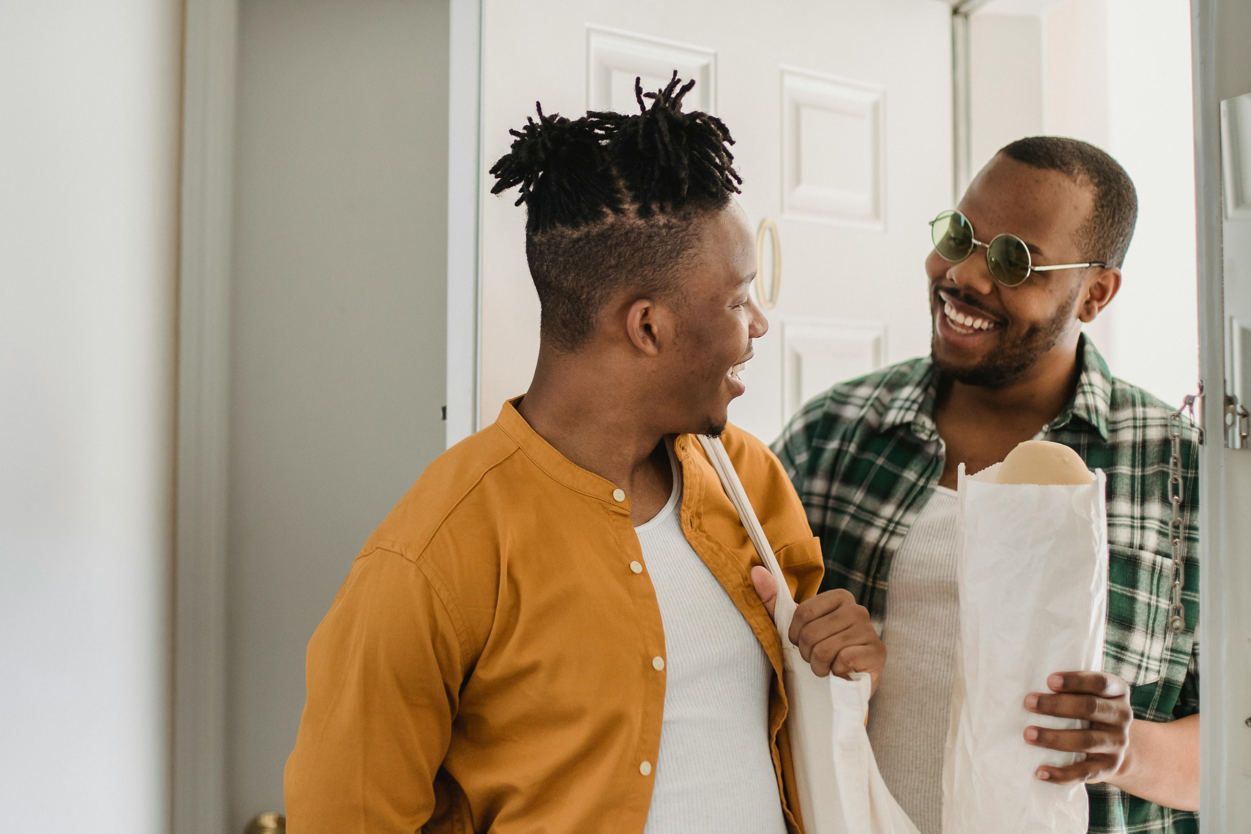 Two Men Standing in Front of a Mirror · Free Stock Photo Two Men Standing in Front of a Mirror · Free Stock Photo
