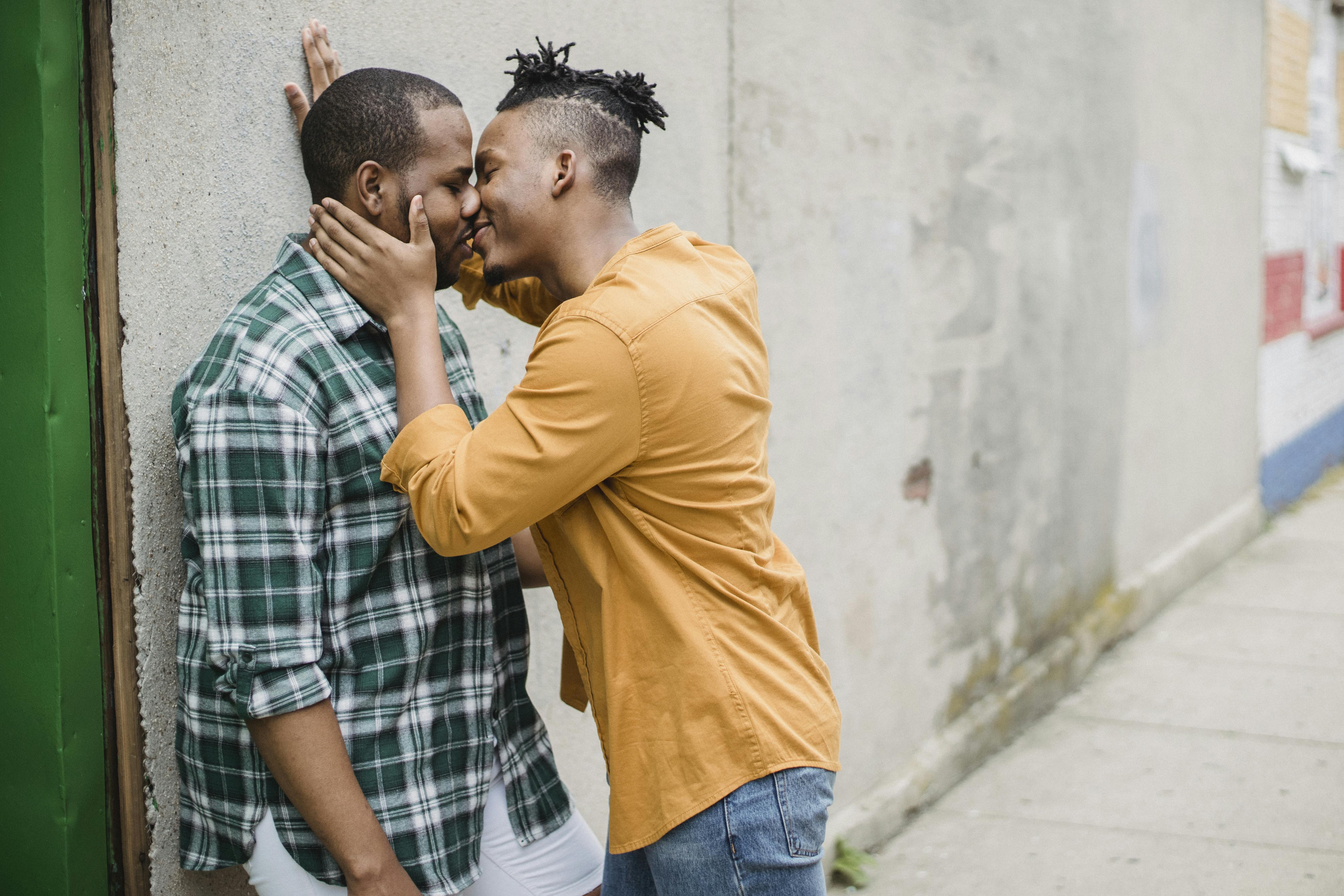 Two Men Kissing · Free Stock Photo