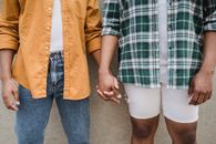 Man in Blue White and Black Plaid Button Up Shirt and Brown Jacket