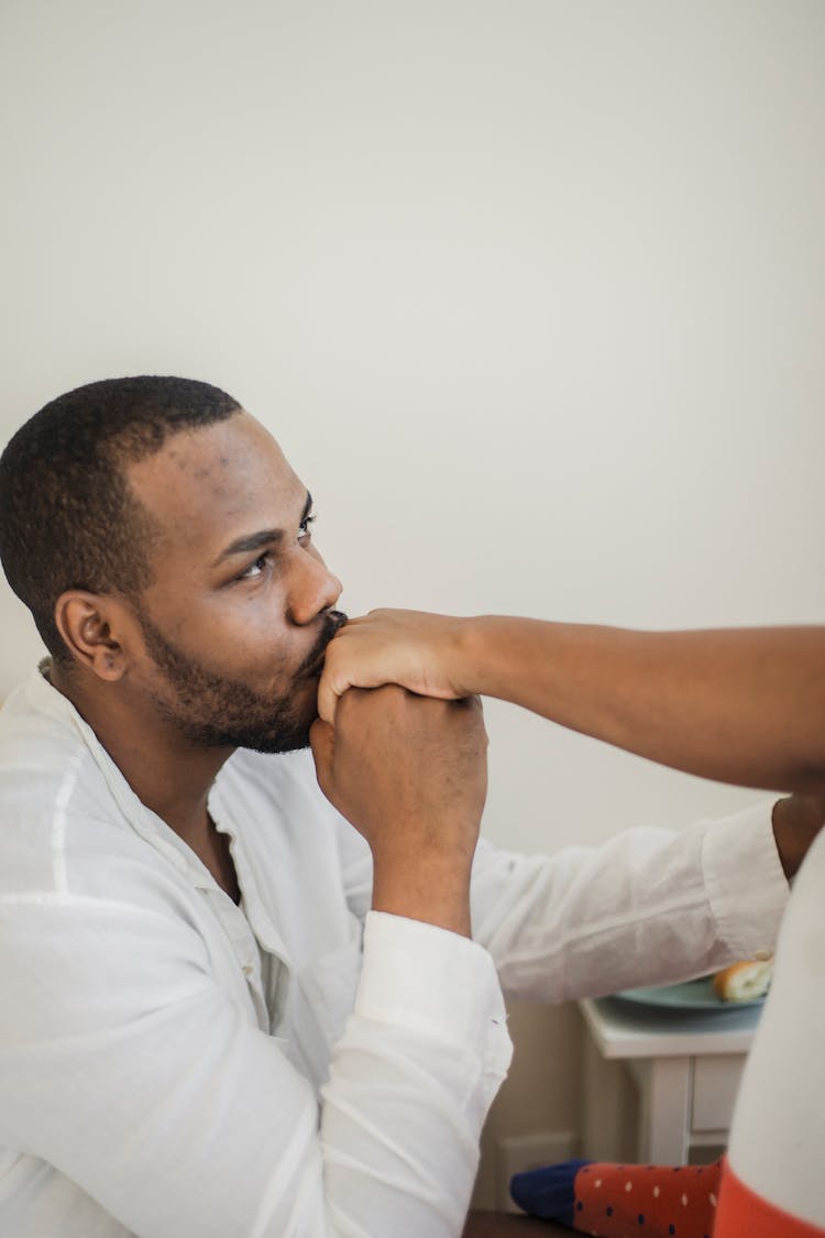 Man Kissing Hand