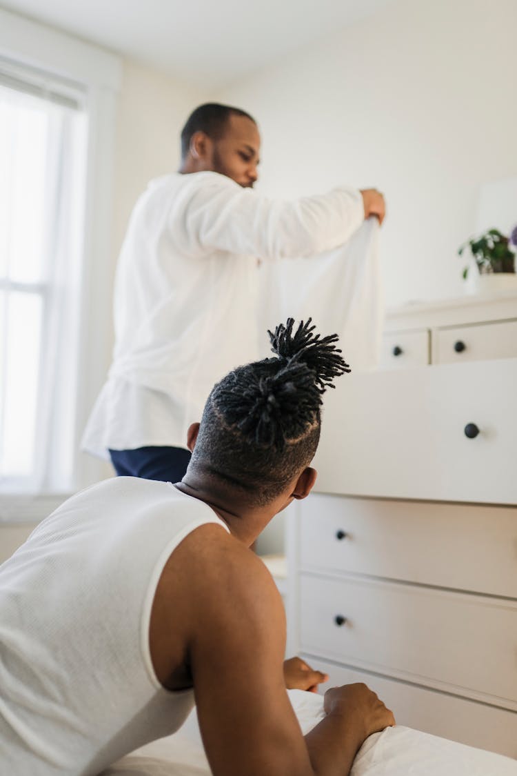 Two Men In Bedroom