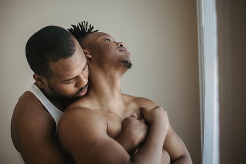 Free Men Hugging Each Other  Stock Photo