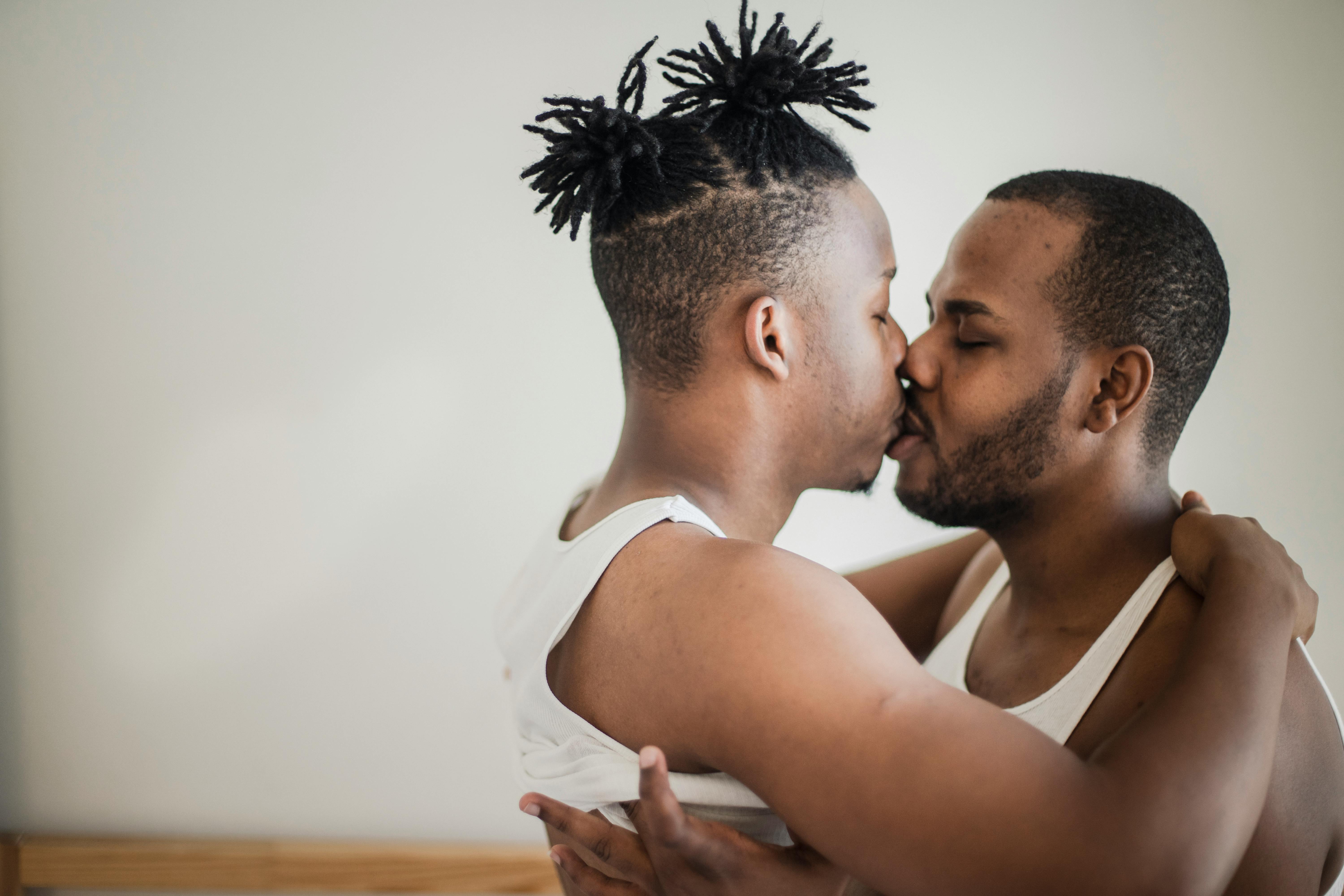 two men kissing