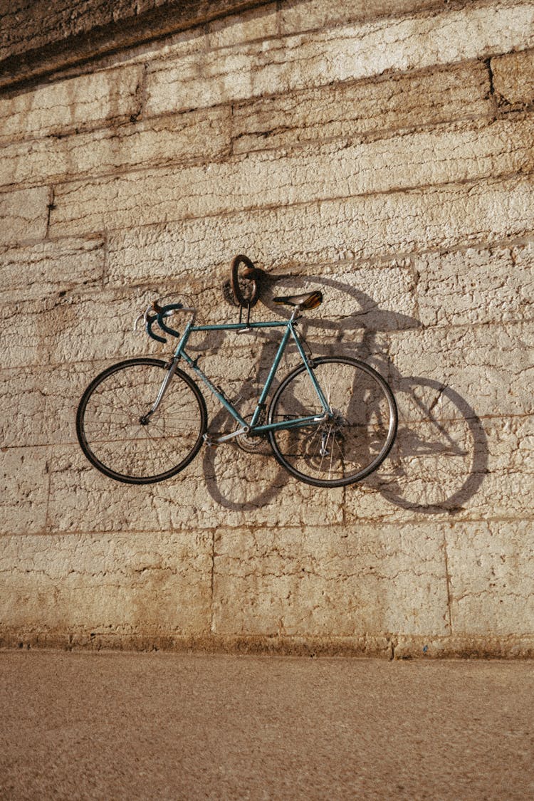 Photo Of A Road Bike Hanging On A Wall