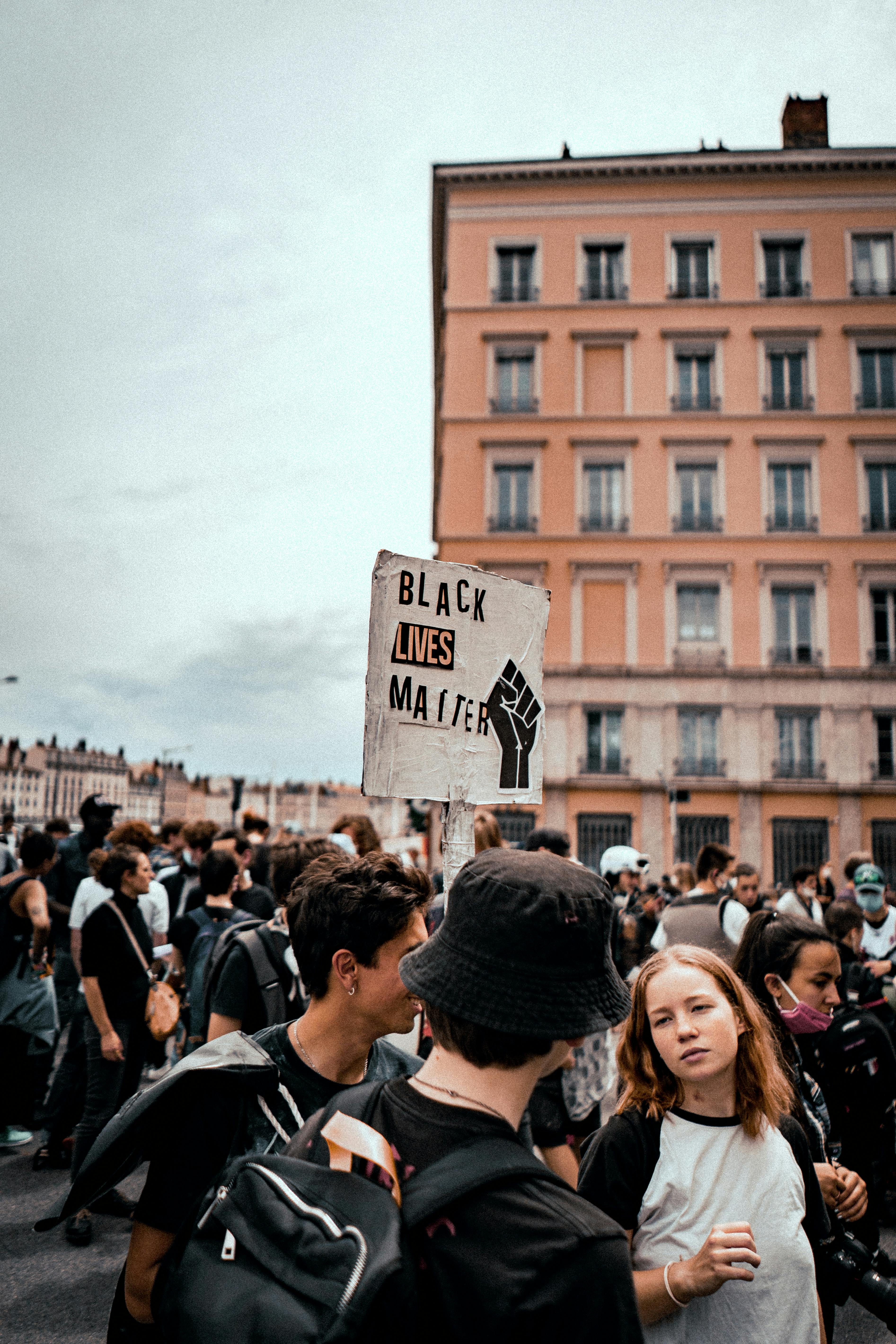 protester holding a black lives matter placard