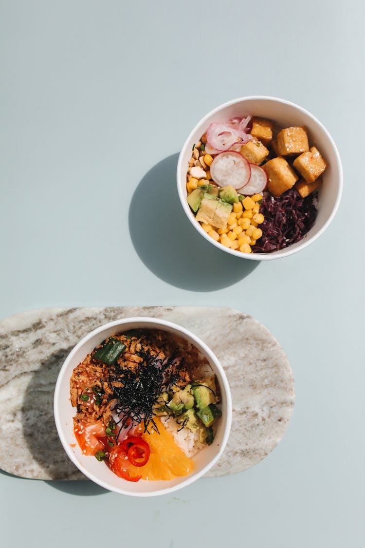 Photograph Of Poke Bowls With Different Kinds Of Ingredients