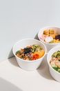 Sliced Fruits in White Ceramic Bowls