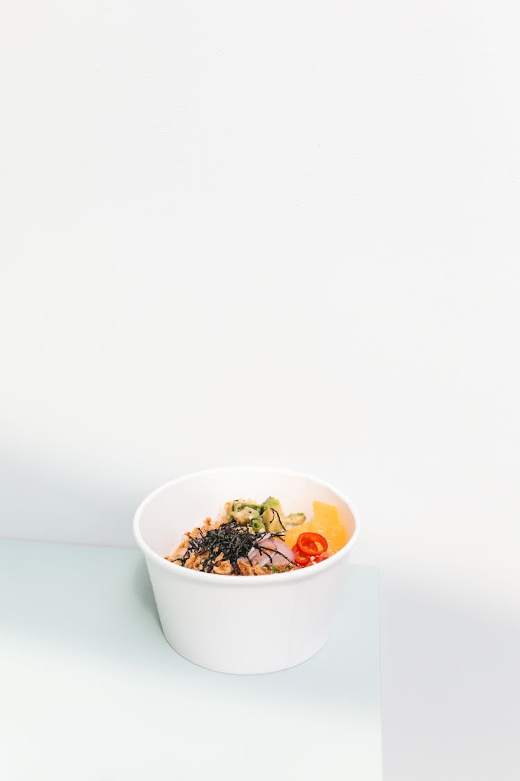 Poke Bowl With Nut And Avocado Slices