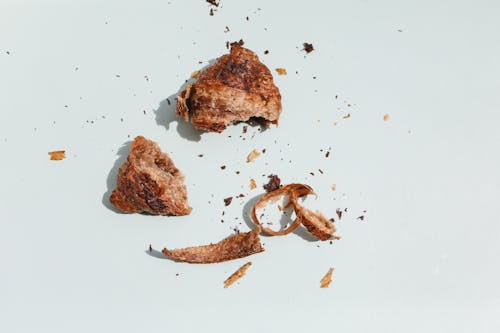 Free Overhead Shot of a Broken Croissant Stock Photo