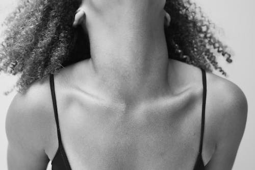 Monochrome Shot of a Person's Collarbone