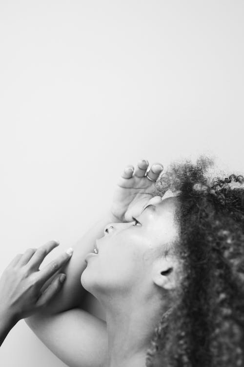 Side View of a Woman with Curly Hair