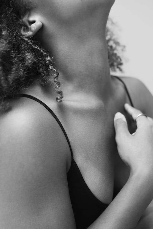 Free Close-up of a Woman Touching her Chest Stock Photo