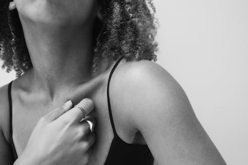 Close-up of a Woman Touching her Chest