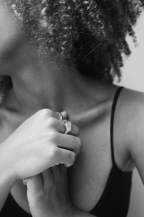 Grayscale Photo of a Woman Wearing Rings