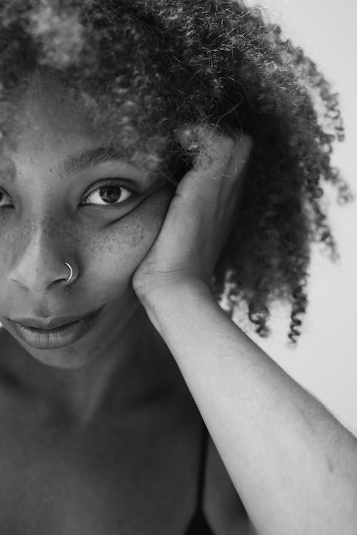 Free Black and White Close Up Portrait of a Curly Hair Woman Stock Photo