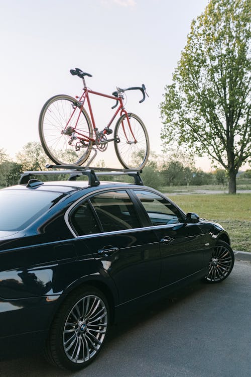 A Bike on the Roof Rack of an Automobile