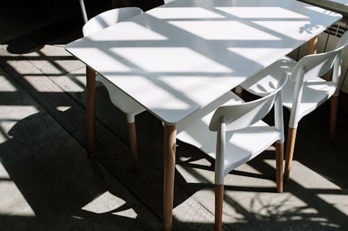 White Wooden Table and Chair Set