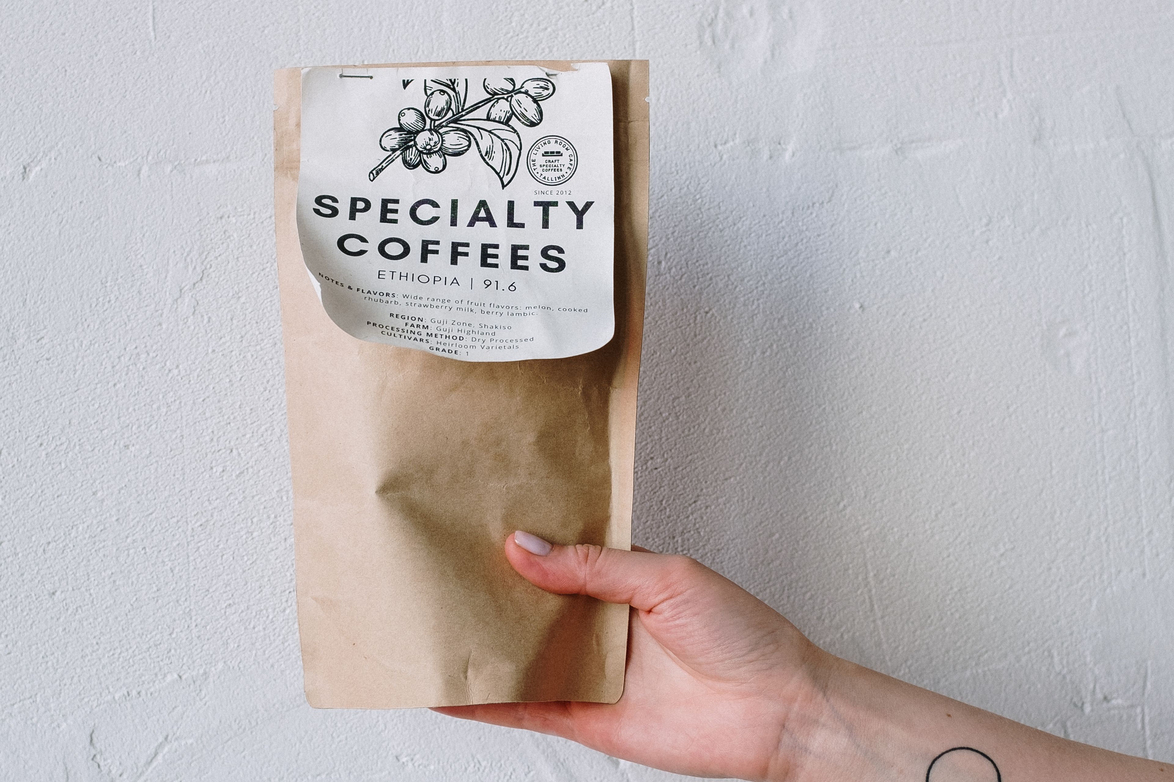 A bag of single origin, held up