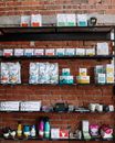 White Ceramic Mugs on Brown Wooden Shelf