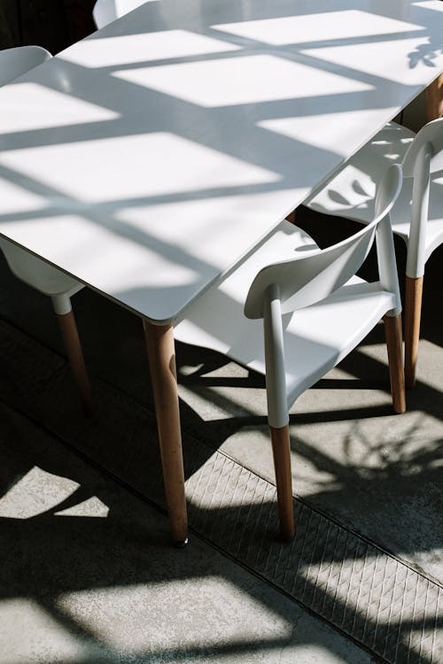White Wooden Table With Chairs