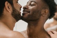 Topless Man and Woman Smiling