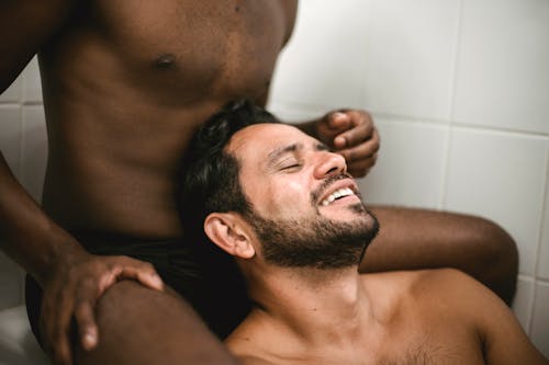 Topless Men in the Bathroom