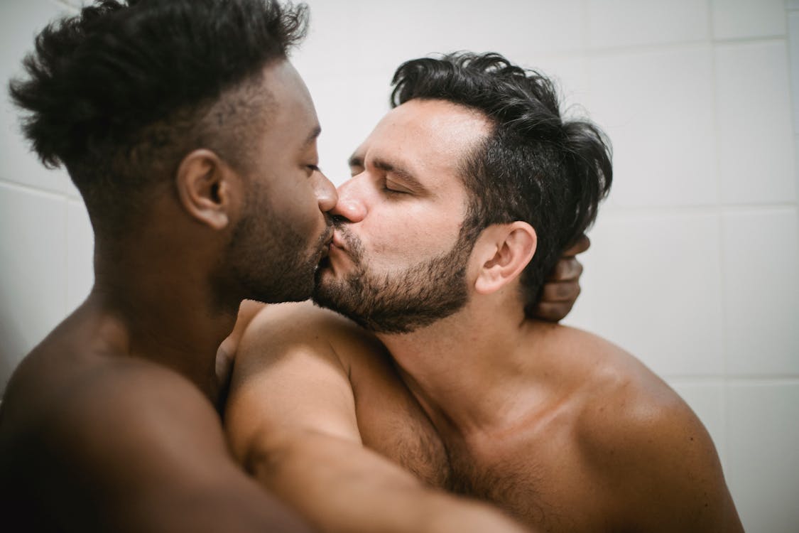 Free Two Men Kissing Stock Photo