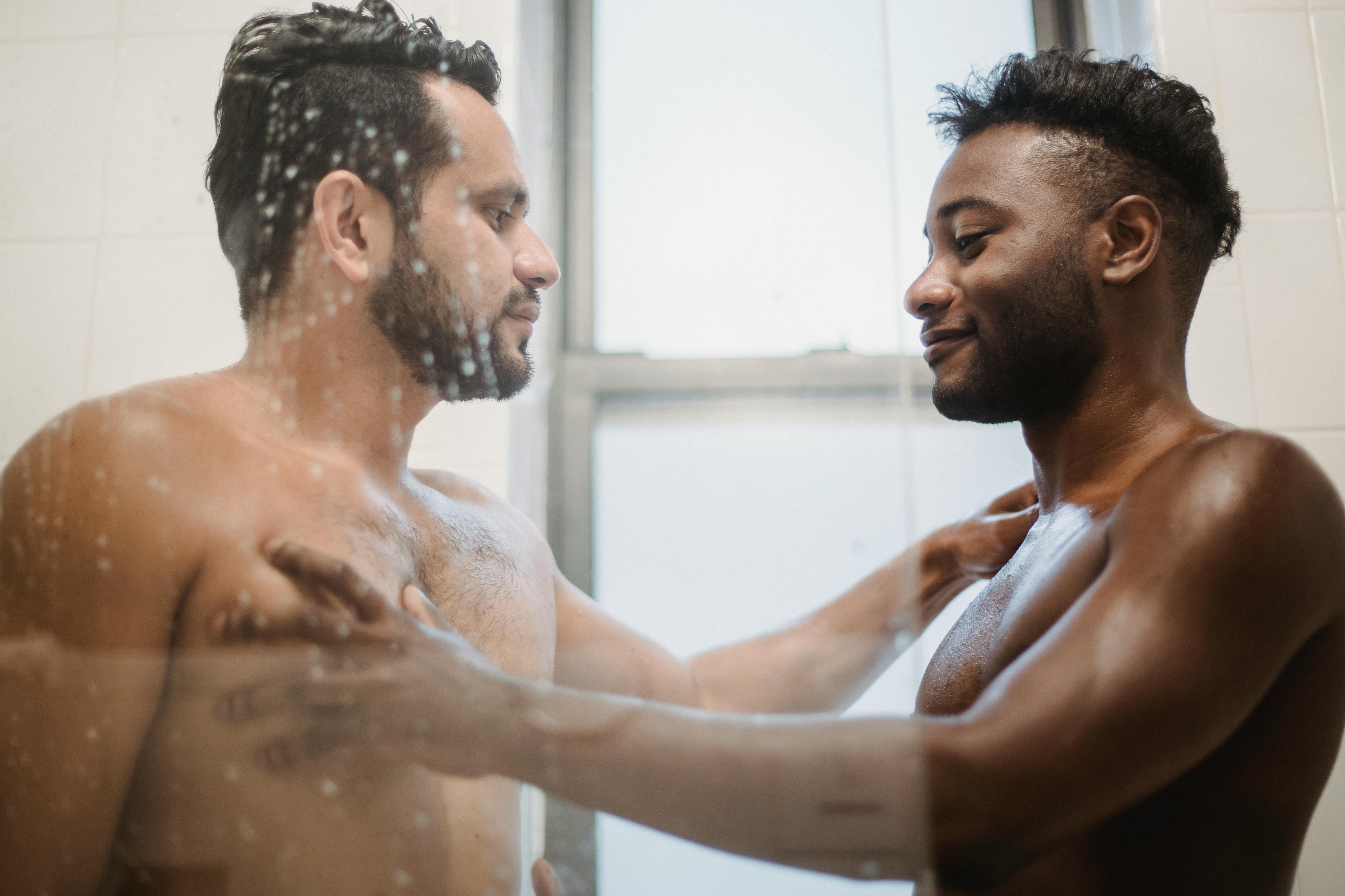 photo of men taking a bath together