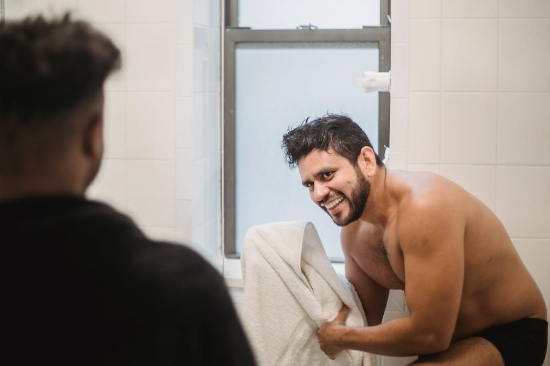 Free Two Men in a Bathroom Stock Photo