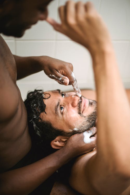 Free Close-up of Two Men in a Bathroom Stock Photo