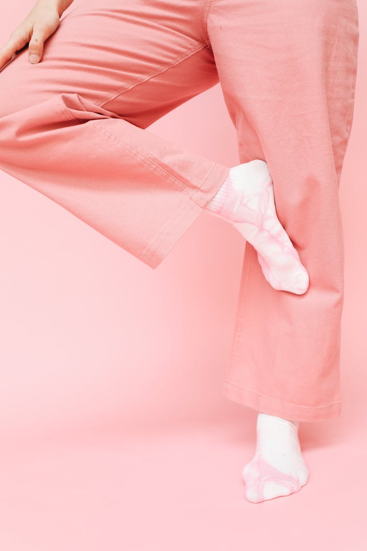 A Person In Pink Pants And Pink Socks