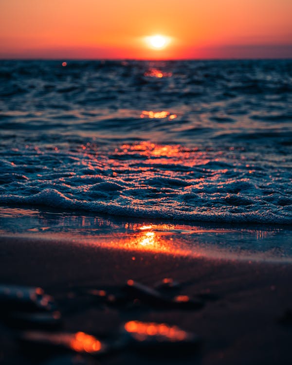 Waving sea at sunset time