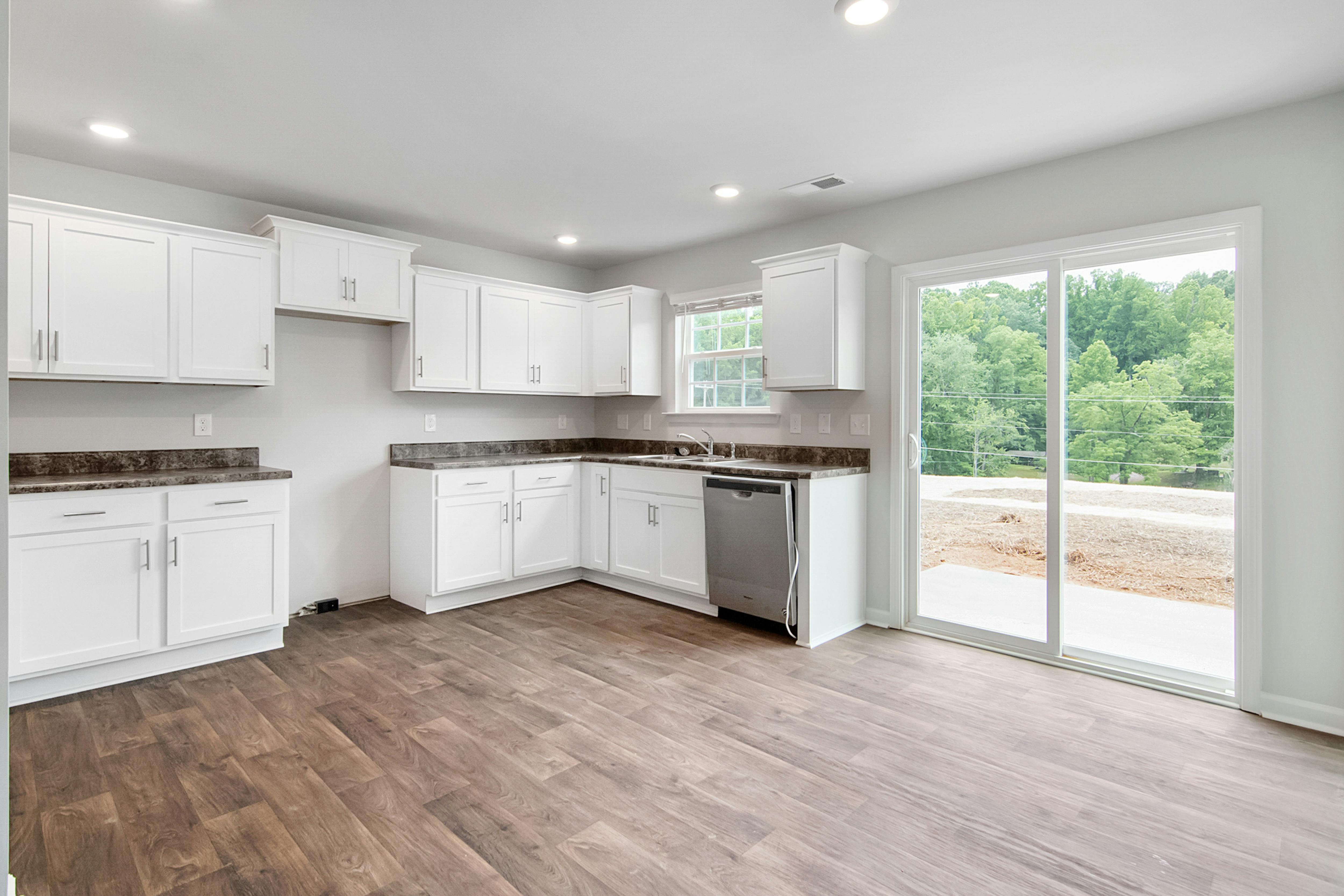 White Wooden Kitchen Cabinet Near Glass Window · Free Stock Photo