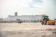 Yellow and Black Heavy Equipment on the Field