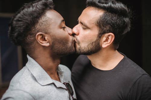 Free Two Men Kissing Stock Photo