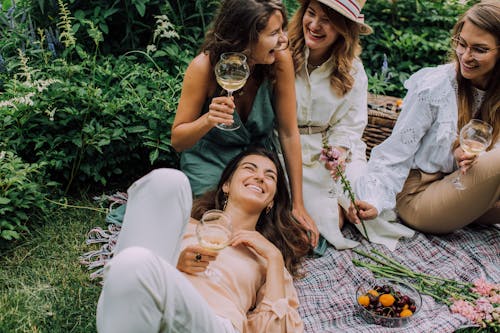 Happy Girls Having Picnic Together