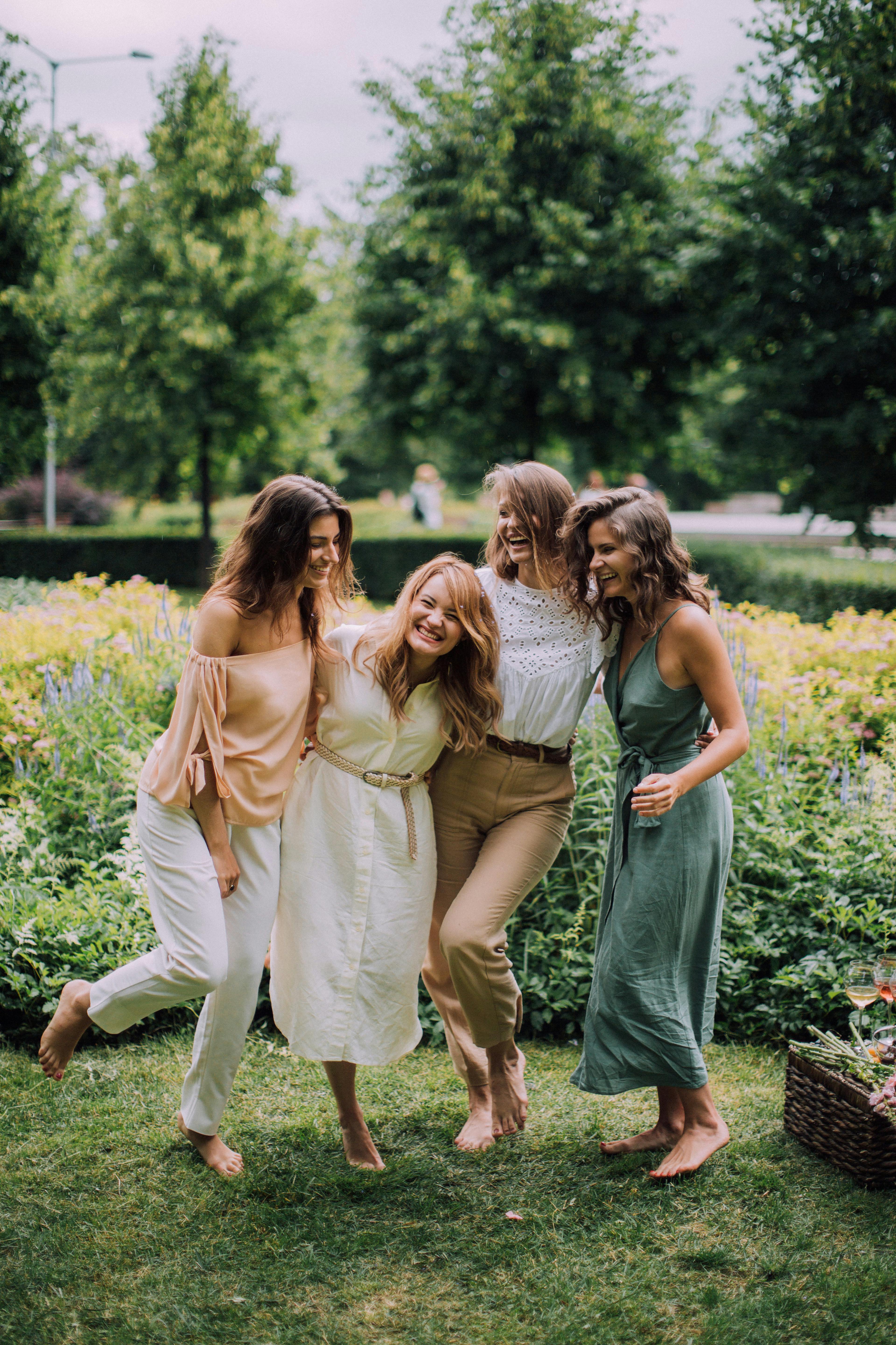 happy people standing at a garden