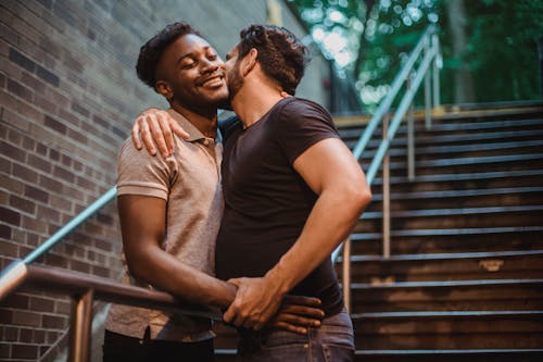 Free A Couple Hugging at Each Other  Stock Photo