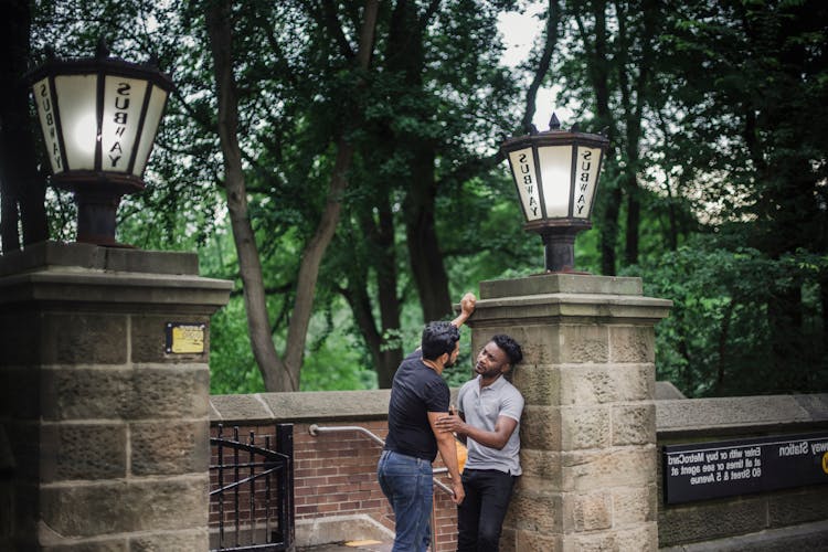 A Men Talking In The Park