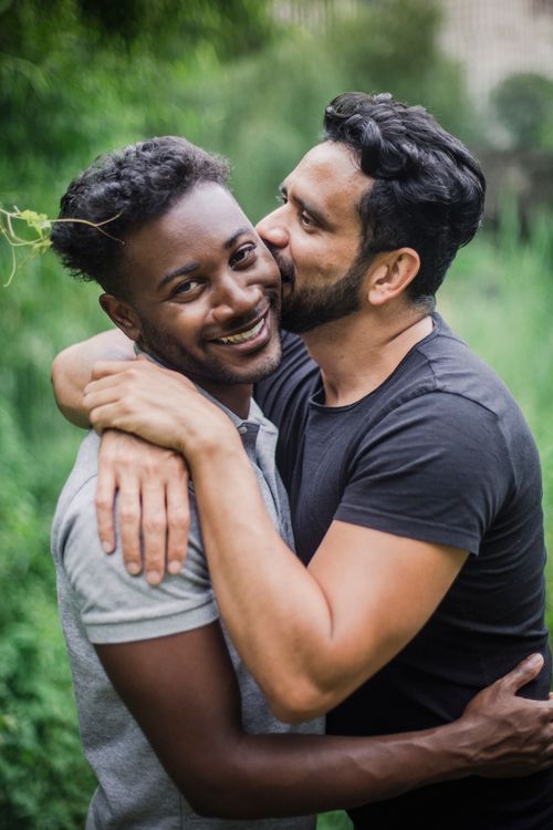 An Affectionate Couple Posing Together · Free Stock Photo