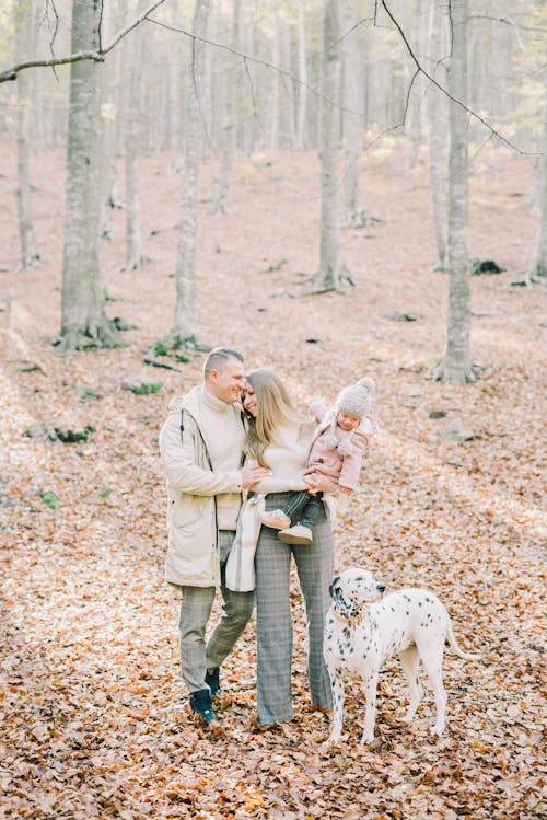 Free A Happy Family in the Woods Stock Photo