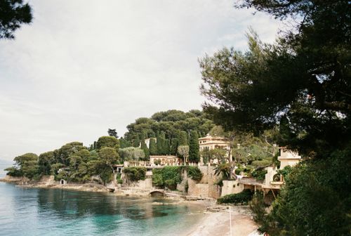 Free Idyllic coastal scene of Paloma Beach with lush greenery and elegant villas. Stock Photo